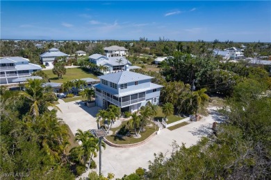 Nestled in the tranquil fishing community of Bokeelia on Pine