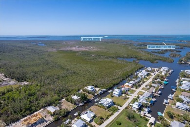Nestled in the tranquil fishing community of Bokeelia on Pine