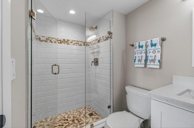 Bright and fully renovated top-floor 2BR/2BA condo in the