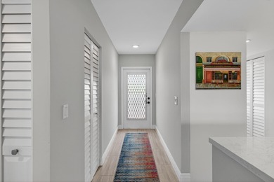 Bright and fully renovated top-floor 2BR/2BA condo in the