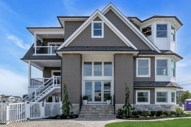 Presenting one of the most iconic custom waterfront homes ever