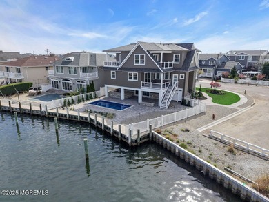 Presenting one of the most iconic custom waterfront homes ever