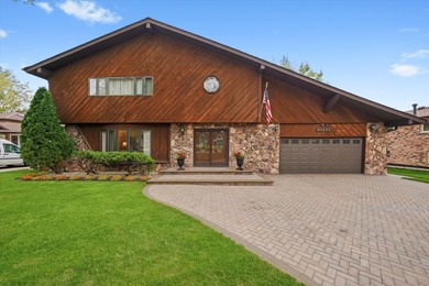 UNIQUE AND CLASSY TWO STORY OVER 2900 SQ FT ON A BEAUTIFUL