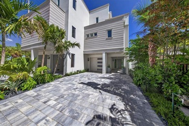RARE OPPORTUNITY TO OWN A STUNNING 3-STORY MASTERPIECE ON THE