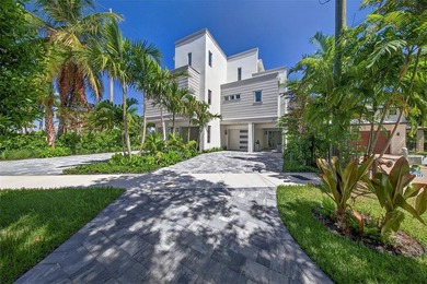 RARE OPPORTUNITY TO OWN A STUNNING 3-STORY MASTERPIECE ON THE