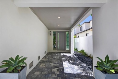 RARE OPPORTUNITY TO OWN A STUNNING 3-STORY MASTERPIECE ON THE