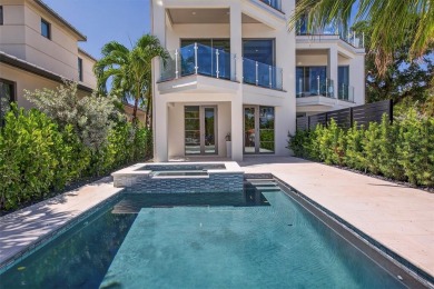 RARE OPPORTUNITY TO OWN A STUNNING 3-STORY MASTERPIECE ON THE