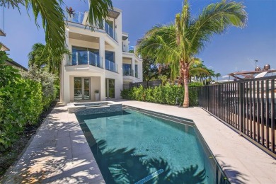 RARE OPPORTUNITY TO OWN A STUNNING 3-STORY MASTERPIECE ON THE