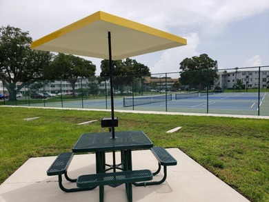 Light, Bright & Beautiful Top-Floor Corner Home in On Top of the