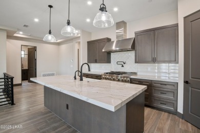 Welcome to 805 Malibu Drive! Located in the gated Malibu