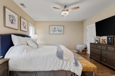 Truly stunning 3-bedroom, 2.5-bath raised beach home located in