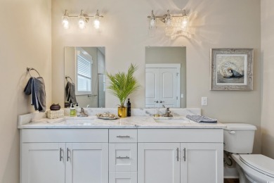 Truly stunning 3-bedroom, 2.5-bath raised beach home located in