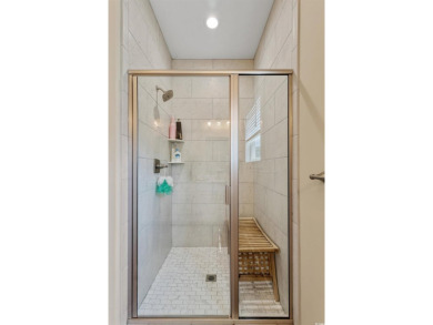 Truly stunning 3-bedroom, 2.5-bath raised beach home located in