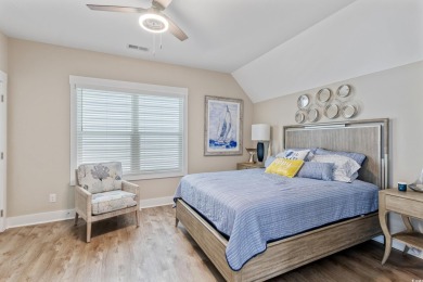 Truly stunning 3-bedroom, 2.5-bath raised beach home located in