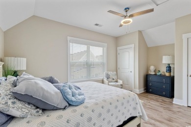 Truly stunning 3-bedroom, 2.5-bath raised beach home located in