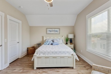 Truly stunning 3-bedroom, 2.5-bath raised beach home located in