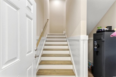 Truly stunning 3-bedroom, 2.5-bath raised beach home located in