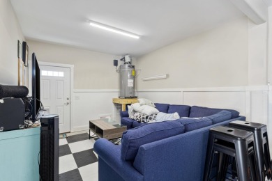 Truly stunning 3-bedroom, 2.5-bath raised beach home located in