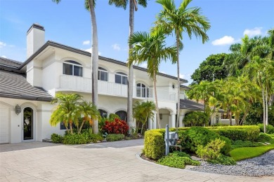 Positioned within the exclusive, guard-gated community of Bay