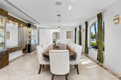 Positioned within the exclusive, guard-gated community of Bay