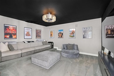 Positioned within the exclusive, guard-gated community of Bay