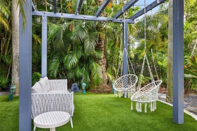 Positioned within the exclusive, guard-gated community of Bay