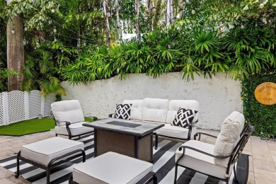 Positioned within the exclusive, guard-gated community of Bay