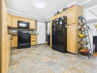 Charming 2-bedroom, 1-bath home with an attached garage, nestled