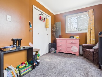 Charming 2-bedroom, 1-bath home with an attached garage, nestled