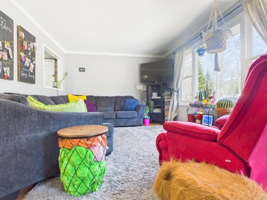 Charming 2-bedroom, 1-bath home with an attached garage, nestled