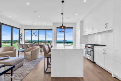 Fabulous four- level townhome with direct ocean view & over 3