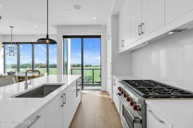 Fabulous four- level townhome with direct ocean view & over 3