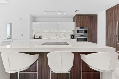 Perched high in the sky on the 26th floor, this exquisite 2