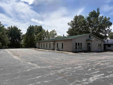 1.55 ACRES with an outstanding 4656 SF building and 20+ spot