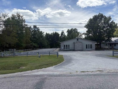 1.55 ACRES with an outstanding 4656 SF building and 20+ spot