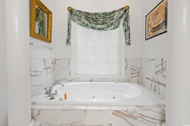 Situated within the quiet and private enclave of Island Green