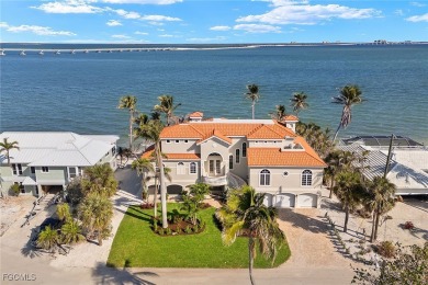 Experience the pinnacle of waterfront luxury in this