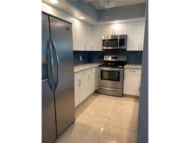 Desirable and spacious 1 bedroom and 1-1/2 bath with golf and