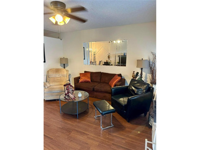 55+ gated community. Bright 1-bedroom, 1-bath condo at Golden