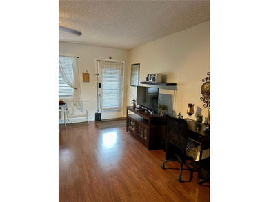 55+ gated community. Bright 1-bedroom, 1-bath condo at Golden