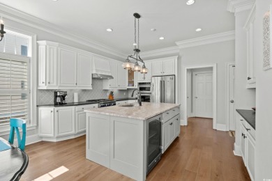 Beach-style Splendor! Welcome to 537 S Dunes Drive, an elegant