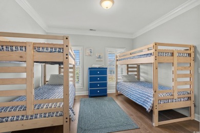 Beach-style Splendor! Welcome to 537 S Dunes Drive, an elegant