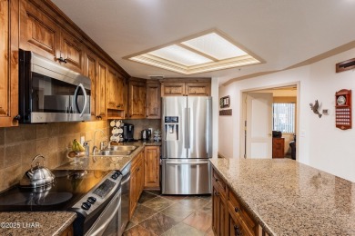 RARE FIND -FIRST LEVEL CONDO AT QB UPSCALE GATED COMMUNITY -