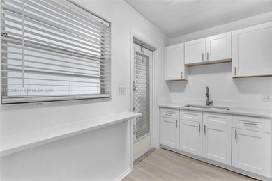 Welcome to this beautifully remodeled condo in a desirable