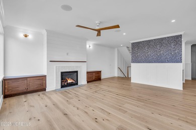 Welcome to an extraordinary custom waterfront residence in