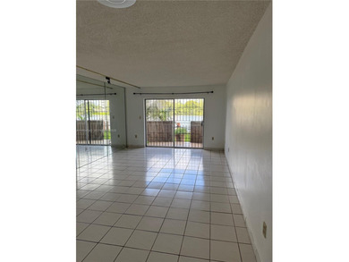 Beautiful lakefront first-floor condo in a desirable 5-story