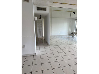 Beautiful lakefront first-floor condo in a desirable 5-story