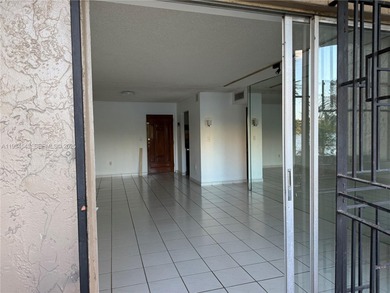 Beautiful lakefront first-floor condo in a desirable 5-story