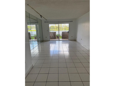 Beautiful lakefront first-floor condo in a desirable 5-story