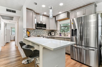 Discover exceptional lakeside living in this rare, rentable